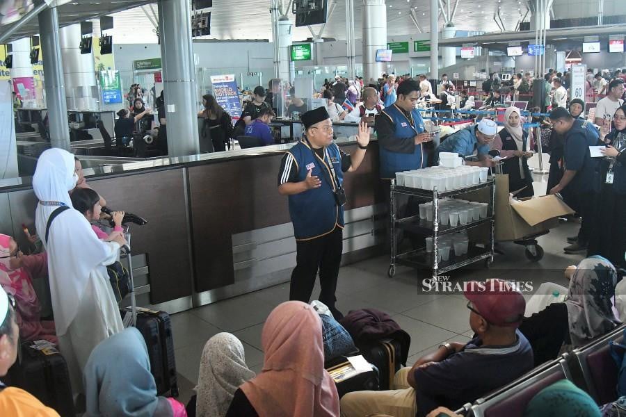 Travel agency chief executive officer Salleh Mohamed, who brought 66 people to perform umrah in Jeddah, said most of them understood it would be dangerous to fly given the volcanic ash. NSTP/MOHD ADAM ARININ
