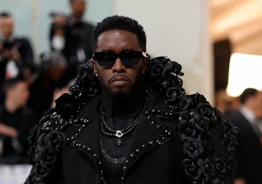 (FILE PHOTO) Sean Diddy Combs poses at the Met Gala, an annual fundraising gala held for the benefit of the Metropolitan Museum of Art's Costume Institute with this year's theme "Karl Lagerfeld: A Line of Beauty", in New York City, New York, U.S. (REUTERS/Andrew Kelly/File Photo)