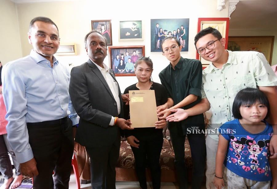 Benefits under the Social Security Organisation (Perkeso) are helping Edna Hipolito Amos, 58, to alleviate her family’s burden after after her lorry driver husband was killed in a car accident on Feb 27. - NSTP/FATHIL ASRI