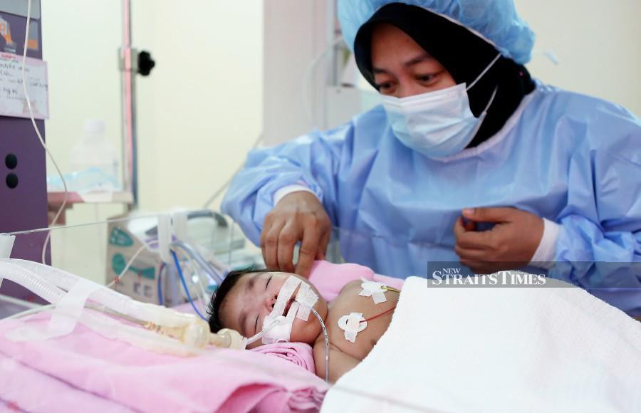 Nurjannah Imani Ahmad Kadim suffers from a condition called patent ductus arteriosus. - NSTP/AMIRUDIN SAHIB