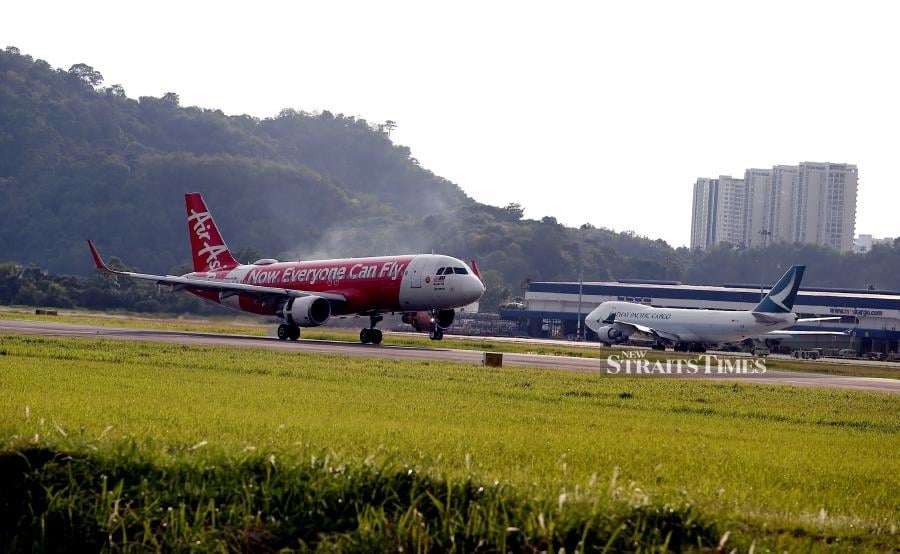 There were 56 passengers on the AirAsia and 154 passengers on the Singapore Airlines flights which touched down at the Penang International Airport (PIA) in Bayan Lepas here at 6.20pm and 7pm respectively. -  NSTP/MIKAIL ONG