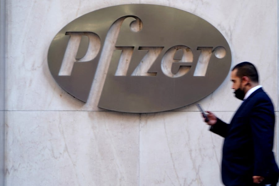Pfizer said its third-quarter revenue was US$13.23 billion, lower than expected, down 42 per cent from a year ago. REUTERS FILE PIC