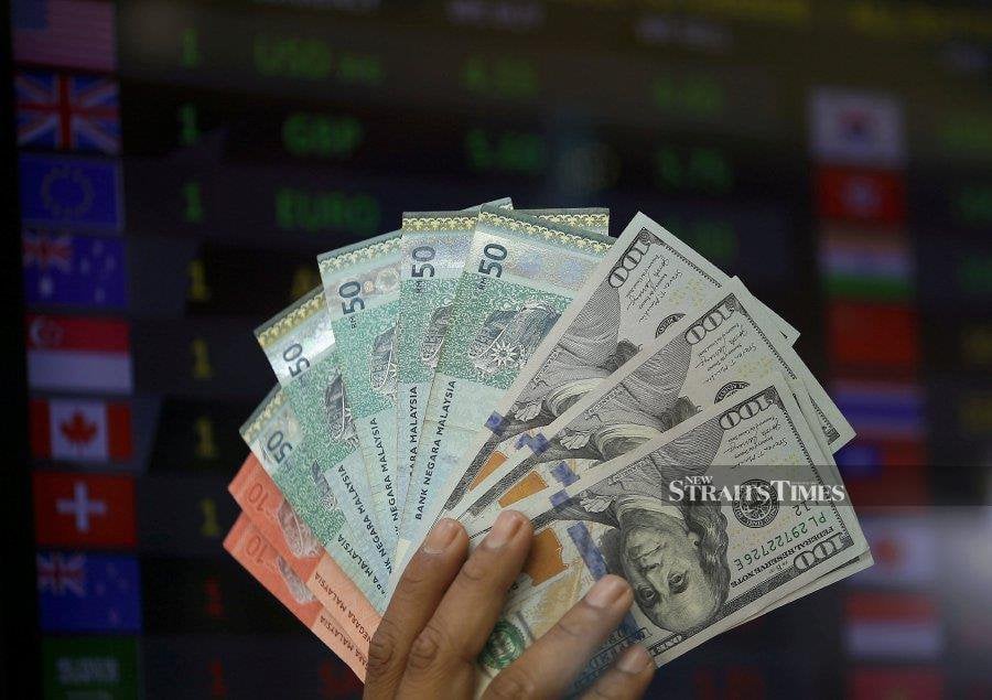 The ringgit continued its upward momentum to open higher against the US dollar today as the United States (US) Treasury yields and dollar indices dropped to their lowest in months, said an analyst. NSTP/MIKAIL ONG