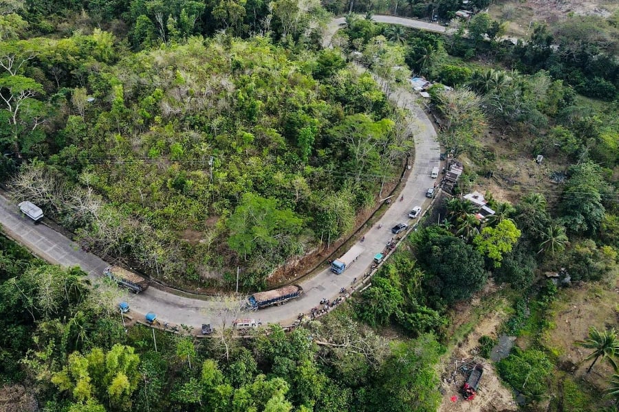 Fifteen people have died after a truck careered off the road and plummeted down a ravine in central Philippines, a rescue official said. (Photo by Facebook account of Zyrus Vince / AFP) 