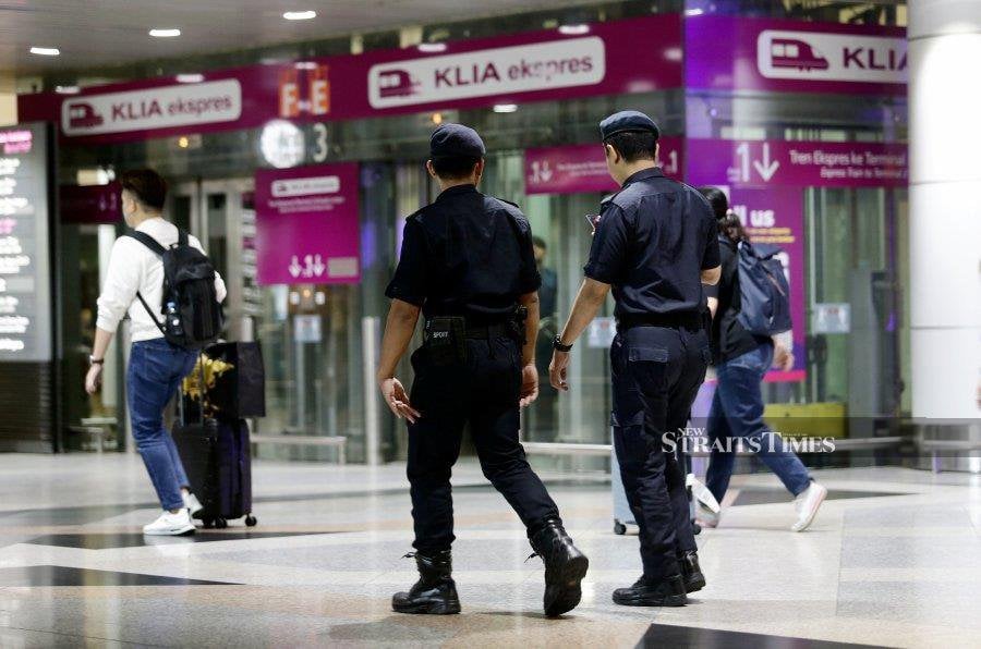 The security members are seen conducting follow-up patrols after the shooting incident at Kuala Lumpur International Airport (KLIA).- NSTP/MOHD FADLI HAMZAH