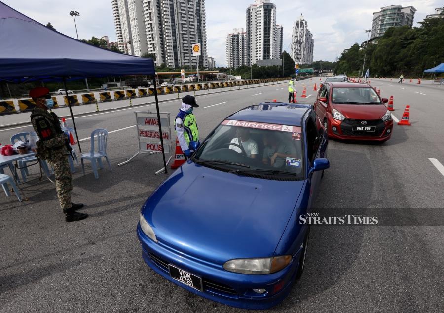 The police will be reducing the number of roadblocks beginning on Monday. -NSTP/MOHAMAD SHAHRIL BADRI SAALI