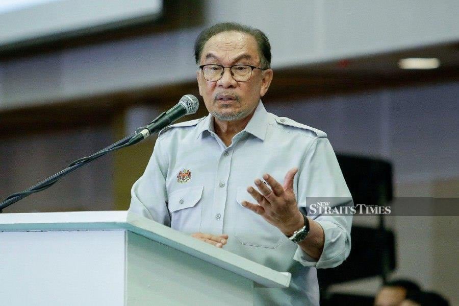 The government’s commitment to raise civil servants’ salaries starting this December will still be fulfilled, said Datuk Seri Anwar Ibrahim. - NSTP/AIZUDDIN SAAD