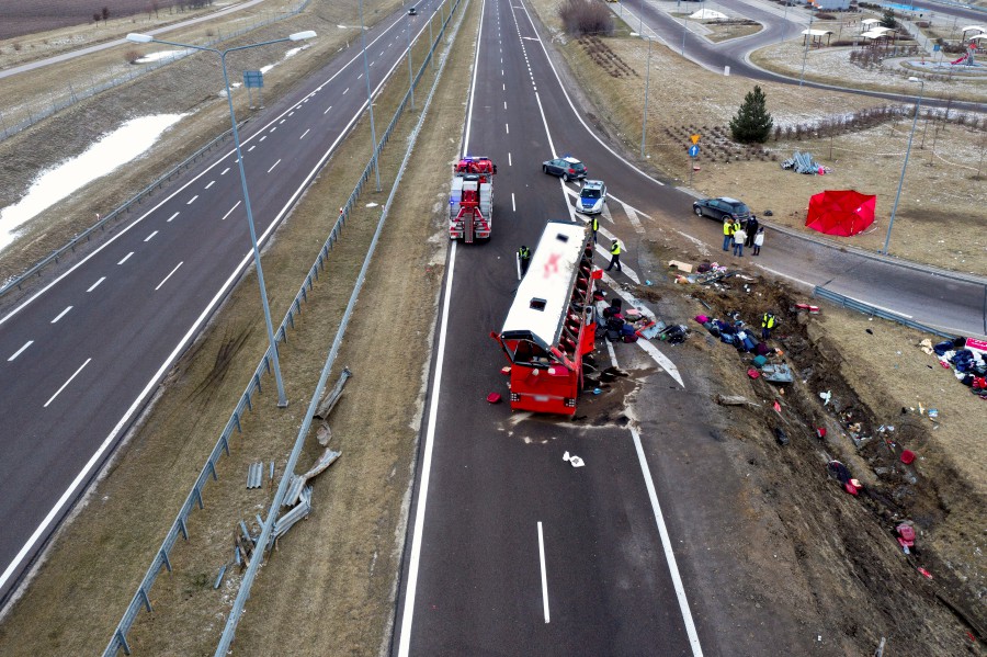 A photograph taken with a drone shows site where a Ukrainian bus fell into a ditch in Kaszyce, Poland, 06 March 2021. Six people died and 30 were injured when a Ukrainian bus carrying 57 passengers fell into a ditch at night in southeastern Poland. - EPA/DAREK DELMANOWICZ 