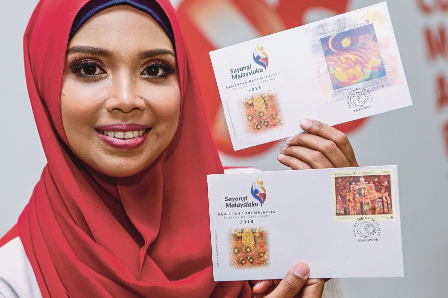 Pos Malaysia Berhad (Pos Malaysia) has unveiled its Malaysia Day 2018 stamp series. Pix by Aizuddin Saad