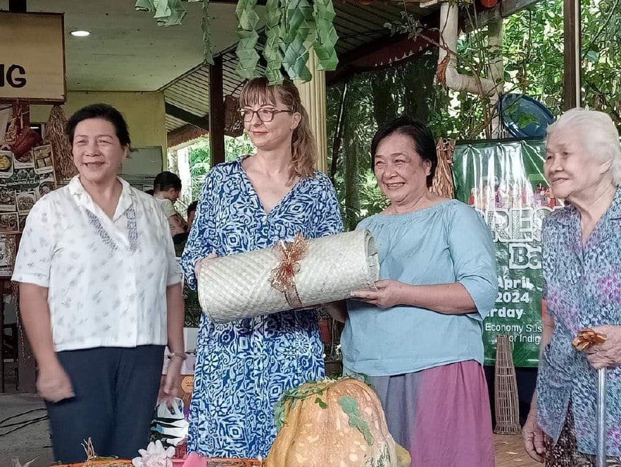 The First Counsellor, EU Delegation to Malaysia Joanna Wasiewska (second right) receiving a souvenir from Executive Director of PACOS Trust, Anne Lasimbang. - Pic courtesy of PACOS Trust. 