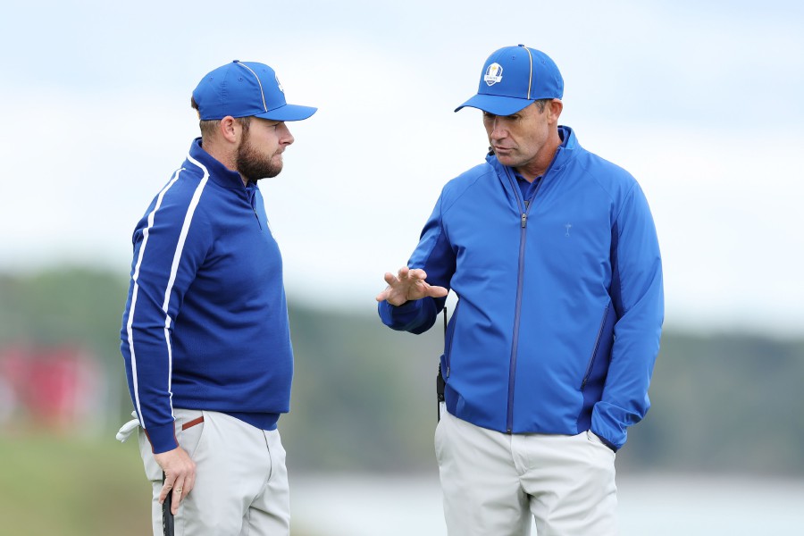 Tyrrell Hatton of England and team Europe talks to captain Padraig Harrington of Ireland and team Europe during a practice round prior to the 43rd Ryder Cup at Whistling Straits on September 21, 2021 in Kohler, Wisconsin. - AFP PIC