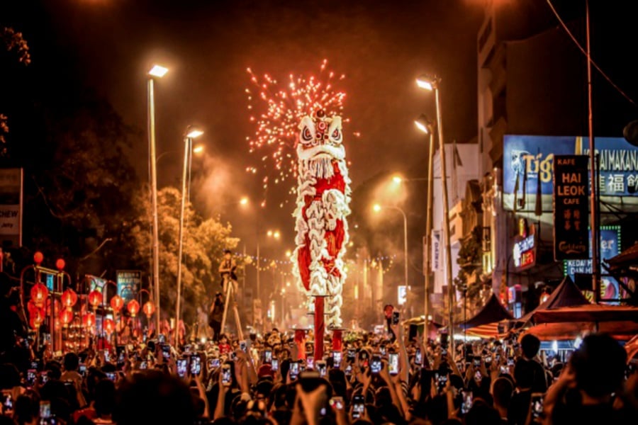 A nighttime Chinese New Year celebration takes place in the streets of Penang. - File pic credit (Penang Global Tourism)
