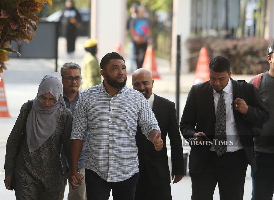 Wan Muhammad Azri Wan Deris seen arriving at the Sessions Court in Kuala Lumpur ahead of his trial. -NSTP/SAIFULLIZAN TAMADI