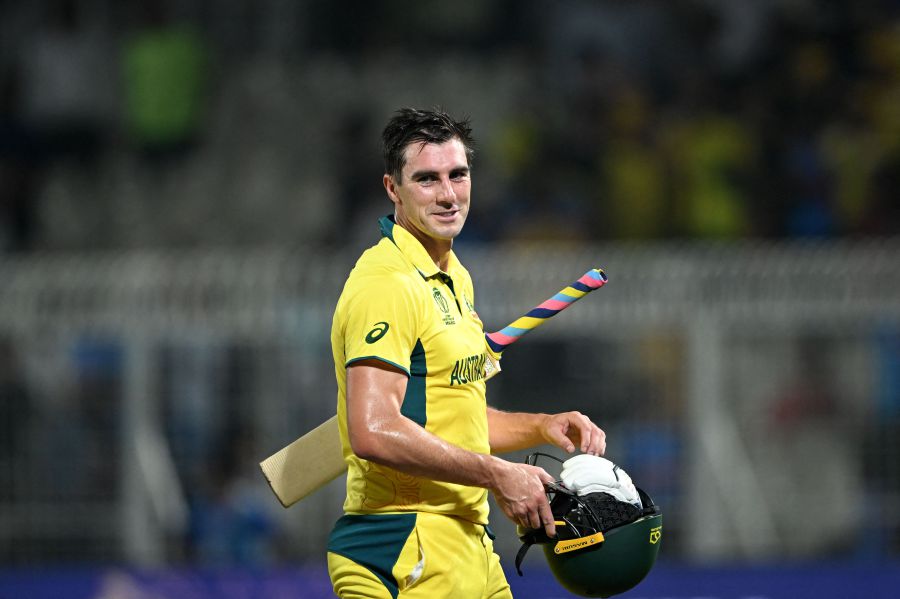Australia's captain Pat Cummins celebrates their win at the end of the 2023 ICC Men's Cricket World Cup one-day international (ODI) second semi-final match against South Africa at the Eden Gardens in Kolkata on November 16, 2023. - AFP pic