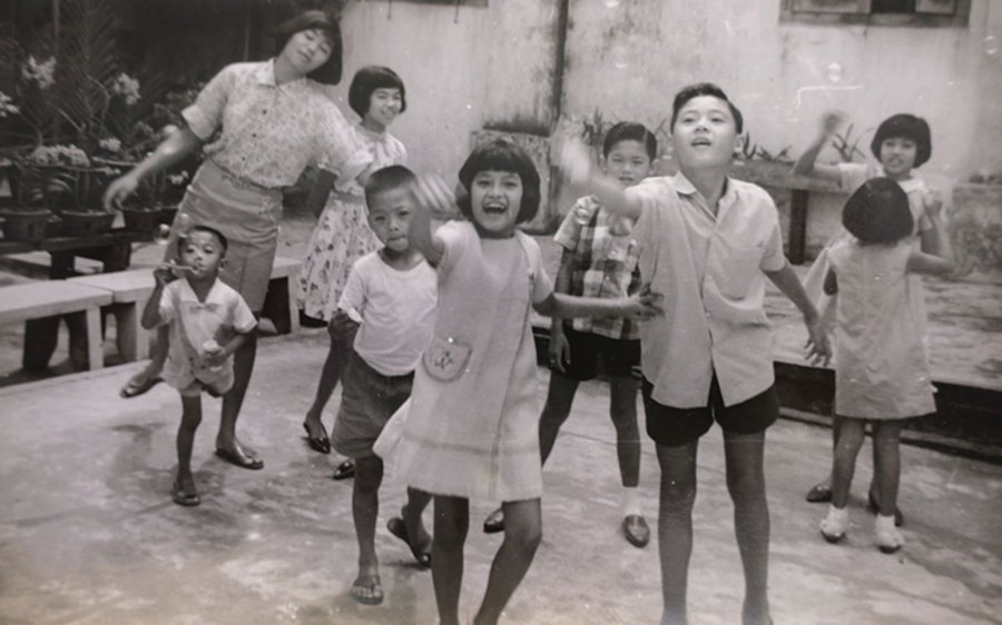 Fun with bubbles on the badminton court during Chinese New Year, 1967. 