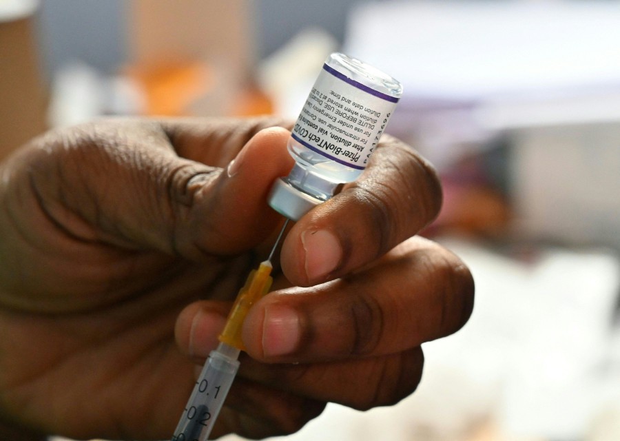 Health director-general Tan Sri Dr Noor Hisham Abdullah says the Sinovac and Pfizer vaccines are very effective at preventing severe disease and hospitalisation. - AFP FILE PIC