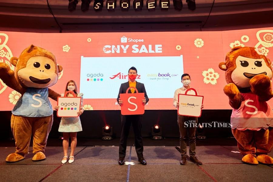 Shopee CNY 2022 with Agoda, Shopee and Easybook. 