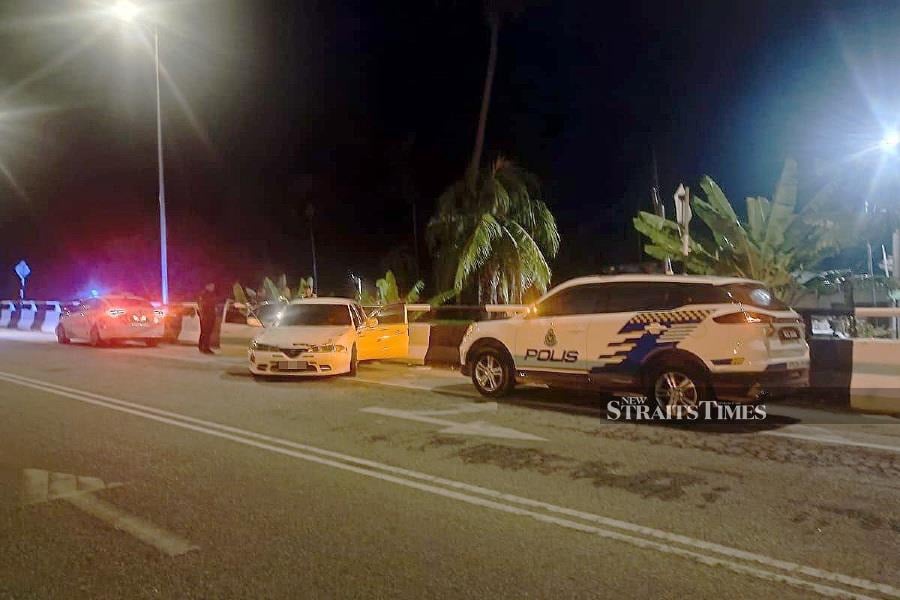 Gerik police officers received information about a Proton Perdana car speeding through a roadblock in Sungai Lebey at 4am. - NSTP/ courtesy of PDRM