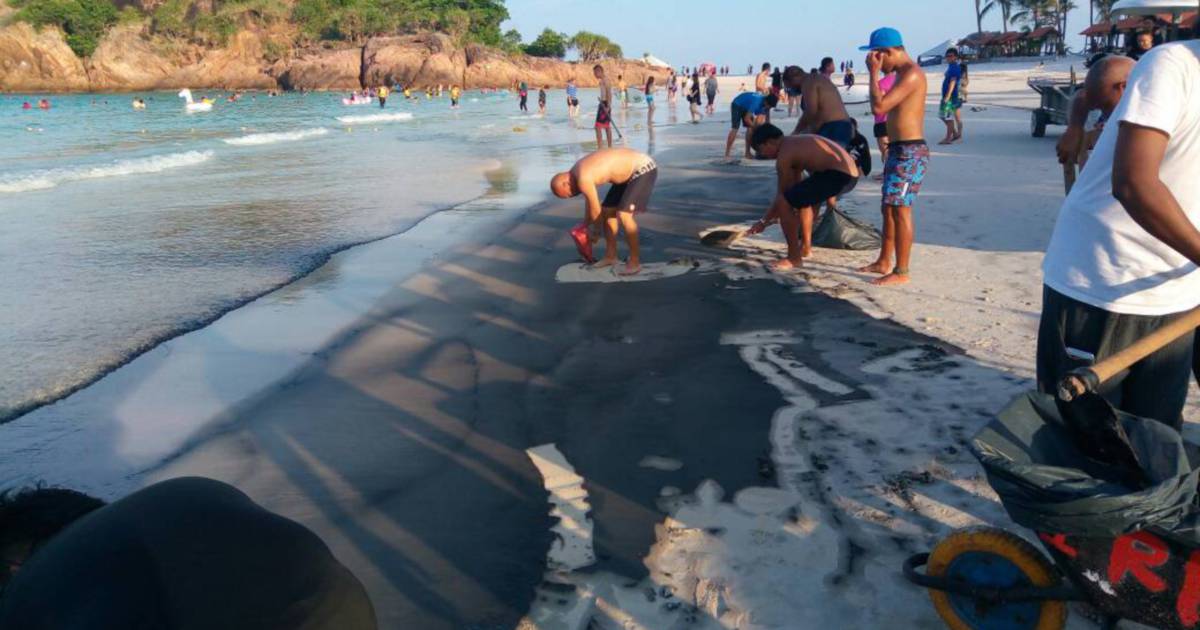 Beach Pollution At Redang Caused By Irresponsible Dumping Of Marine Oil