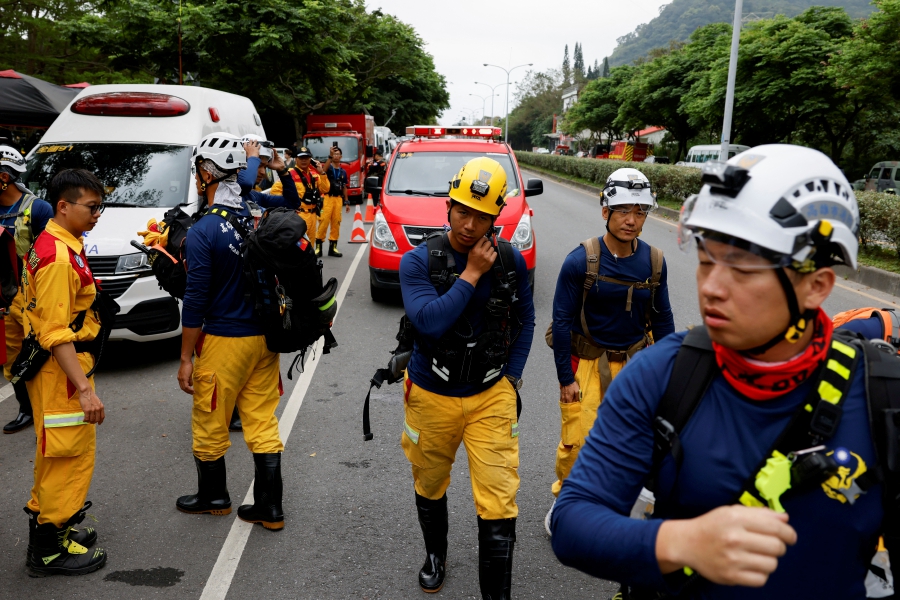 Emergency personnel prepare to depart for rescue operations, following the earthquake, in Hualien, Taiwan. (REUTERS/Tyrone Siu)