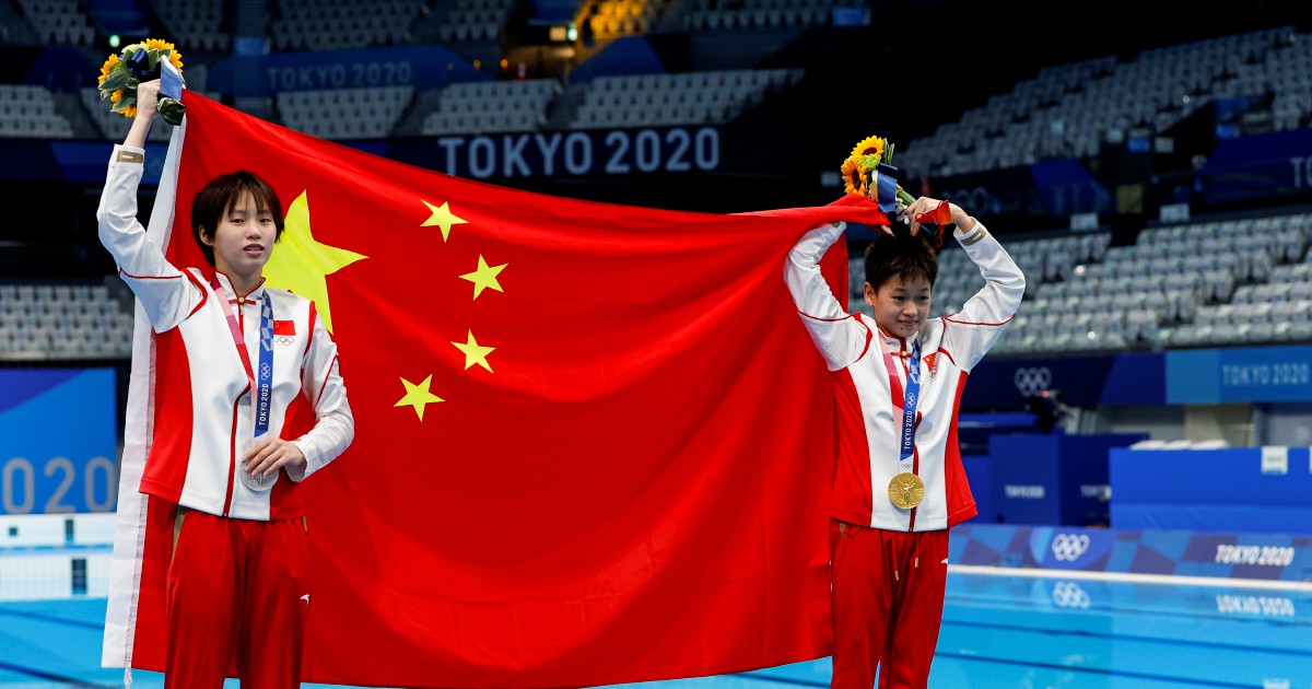 China's Quan, 14, wins Olympic gold with three perfect dives