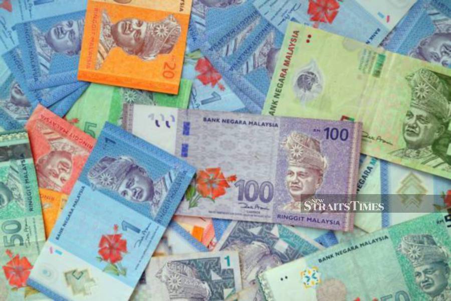 The ringgit staged another strong move at the opening today, thanks to stronger oil and commodity prices. - NST/file pic. 