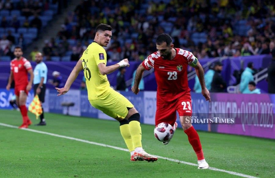 Colombian-born hitman Romel Morales (left) said Malaysia missed several scoring chances against Oman on Thursday and he hopes the team can finish them off in the return match on Tuesday at Bukit Jalil. - NSTP file pic