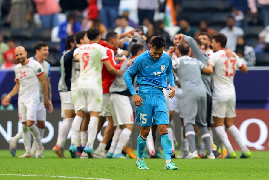 Syria players celebrate after the match as India's Udanta Singh looks dejected. - REUTERS pic