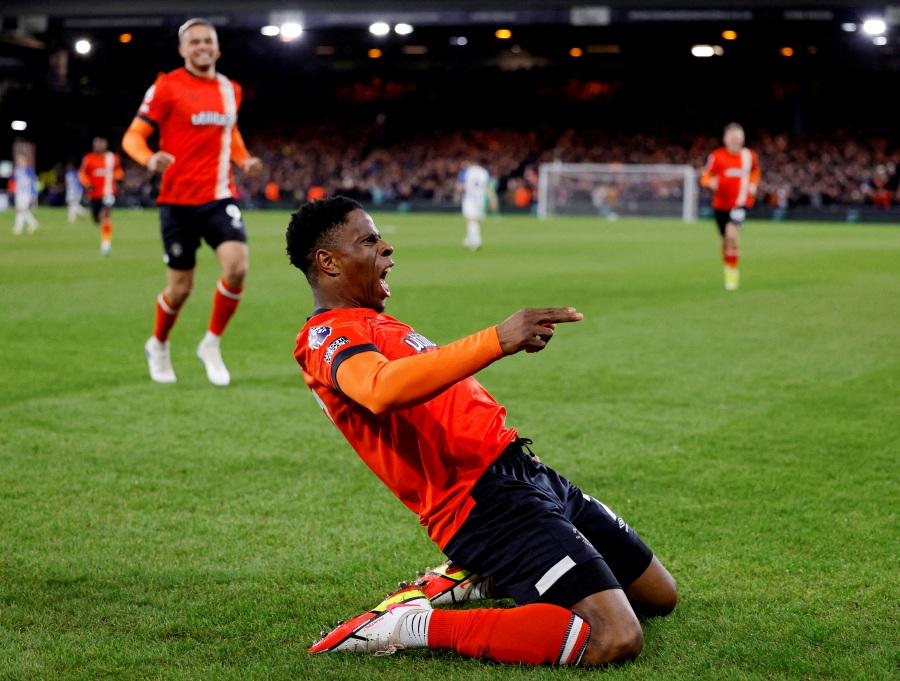 Luton Town's Chiedozie Ogbene celebrates scoring their second goal. - Reuters pic