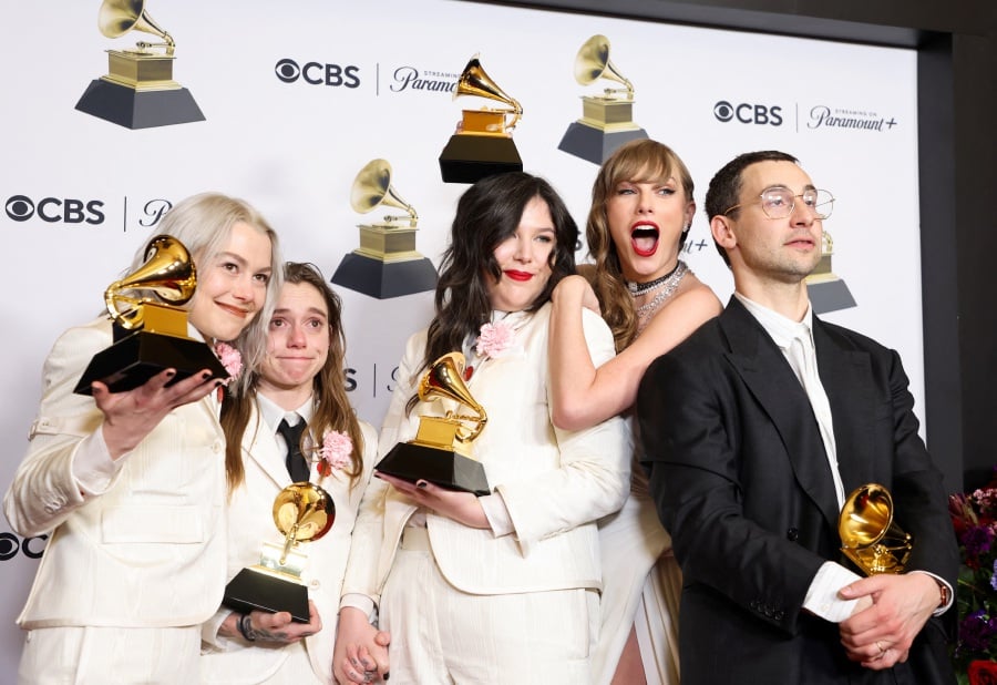 Phoebe Bridgers, Lucy Dacus, and Julien Baker of boygenius pose with the Best Alternative Music Album award, the Best Rock Song award and the Best Rock Performance award accompanied by Taylor Swift and Jack Antonoff during the 66th Annual Grammy Awards in Los Angeles, California, U.S., February 4, 2024.- REUTERS pic