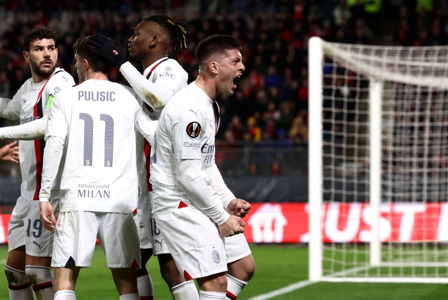 AC Milan's Luka Jovic celebrates scoring their first goal. -REUTERS pic