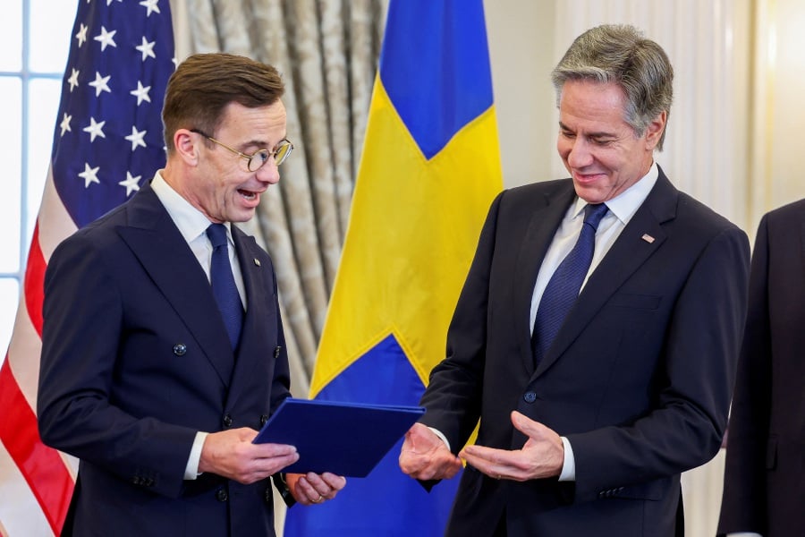 U.S. Secretary of State Antony Blinken accepts Sweden's instruments of accession from Swedish Prime Minister Ulf Kristersson for its entry into NATO at the State Department in Washington, U.S., March 7, 2024. - REUTERS pic