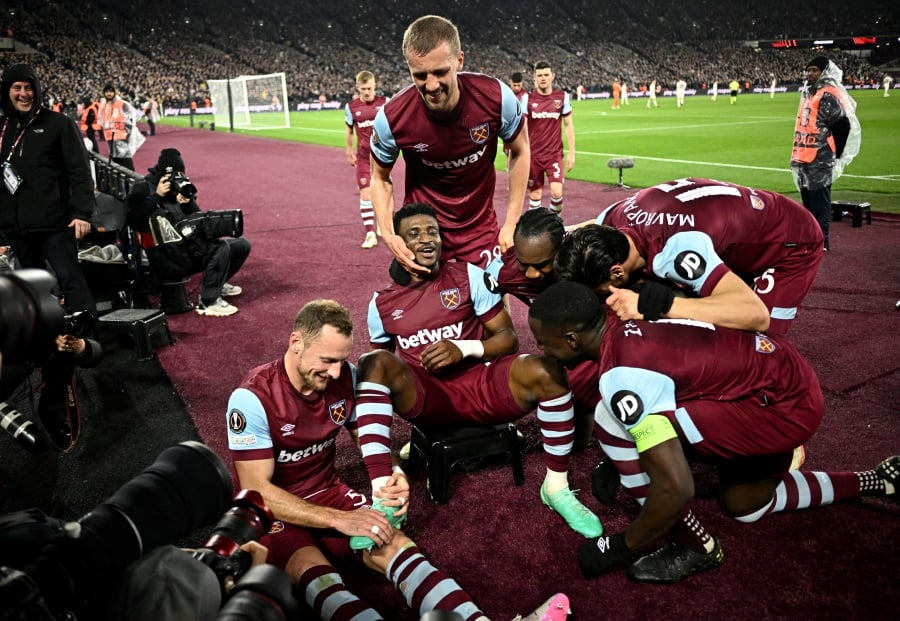 West Ham United's Mohammed Kudus celebrates scoring their fourth goal with teammates. -REUTERS PIC