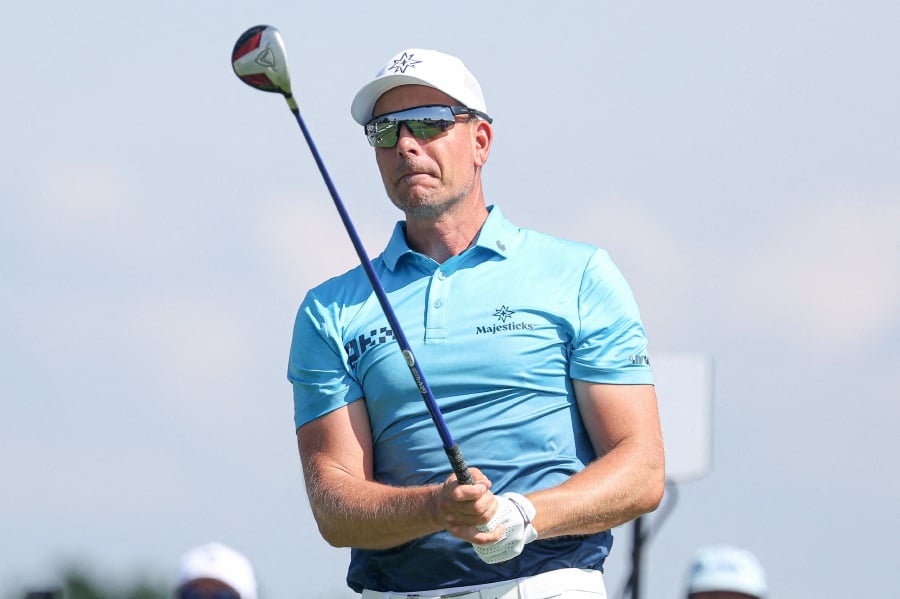FILE PHOTO: Aug 11, 2023; Bedminster, New Jersey, USA; Henrik Stenson plays his shot from the tenth tee during the first round of the LIV Golf Bedminster golf tournament at Trump National Bedminster. Mandatory Credit: Vincent Carchietta-USA TODAY Sports/File Photo