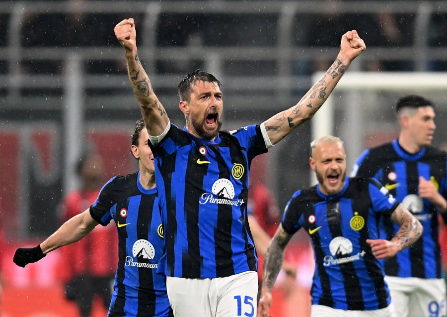 Inter Milan's Francesco Acerbi celebrates scoring their first goal. - REUTERS pic