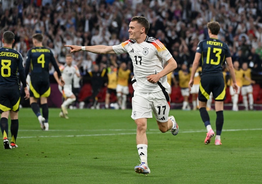 Germany's Florian Wirtz celebrates scoring their first goal. - REUTERS PIC