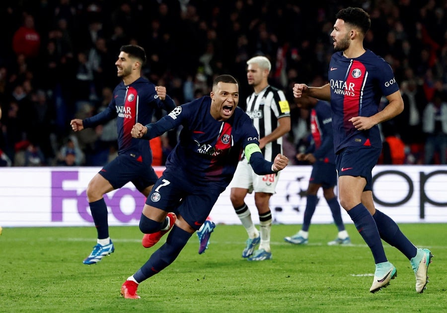 Paris St Germain's Kylian Mbappe celebrates scoring their first goal. - REUTERS Pic