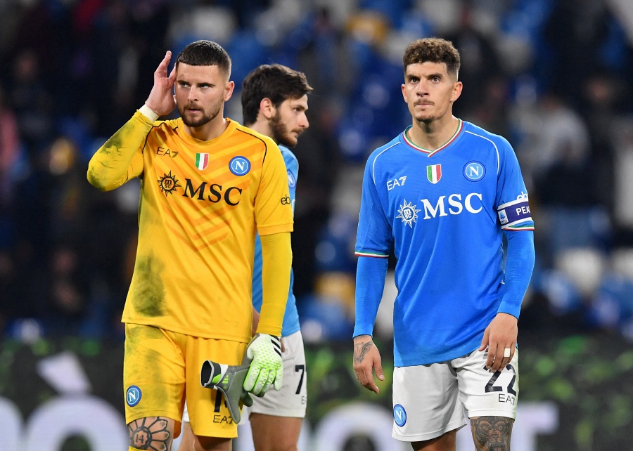 Napoli's Nikita Contini, Khvicha Kvaratskhelia and Giovanni Di Lorenzo react after the match. - REUTERS pic