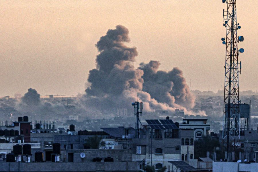 A picture taken from Rafah shows smoke billowing over Khan Yunis in the southern Gaza Strip during Israeli bombardment, as the war between Israel and the Palestinian fighters group Hamas enters its 100th day on January 14, 2024. - AFP pic