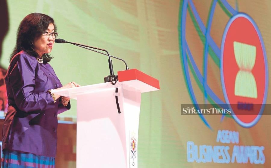 Former international trade and industry minister Tan Sri Rafidah Aziz speaking at an Asean meeting. Her approach was to encourage delegates to skip the formalities and dive straight into substantive issues, saving time and ensuring more meaningful discussions. FILE PIC