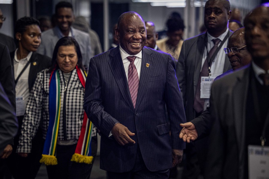 South African President and President of the African National Congress (ANC) Cyril Ramaphosa (C). -- AFP