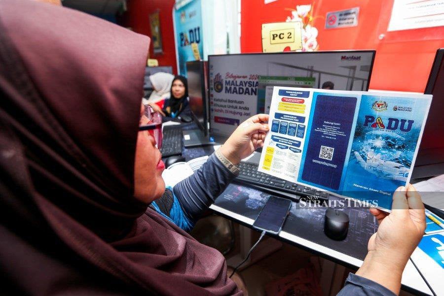 An economist has warned that the low number of Central Database Hub (Padu) registrations may make it challenging for the government to target aid initiatives better. - NSTP/NIK ABDULLAH NIK OMAR