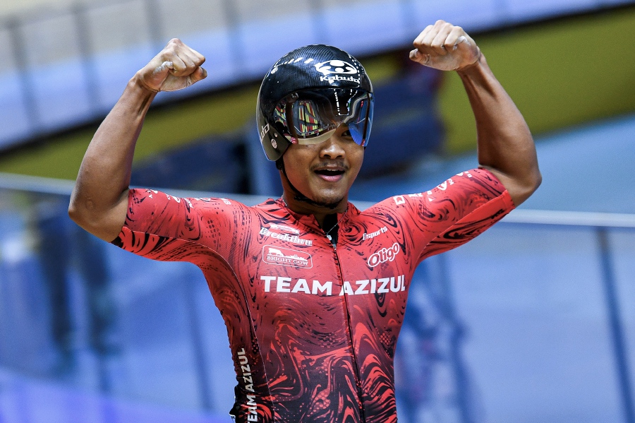Ridwan Sahrom, 23, beat his elder brother Shah Firdaus, 29, for the first time to win the mens keirin gold at the National Velodrome yesterday. -, Bernama pic