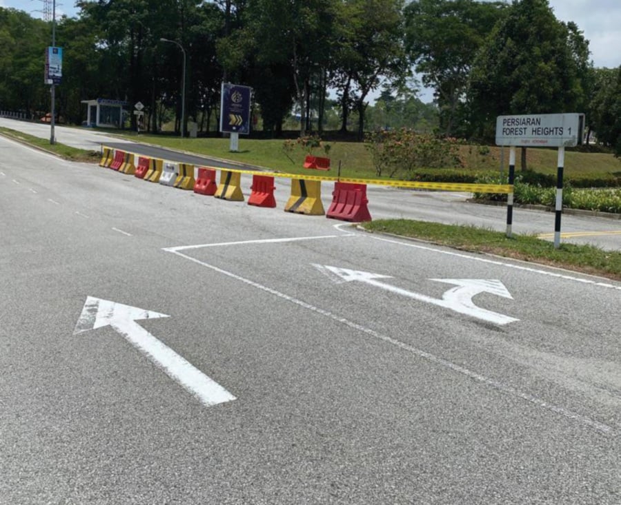 The closure of the mid-section of the road where the accident occurred forced motorists to drive further up to the other equally dangerous junction to get to their destination. - Pic courtesy of writer