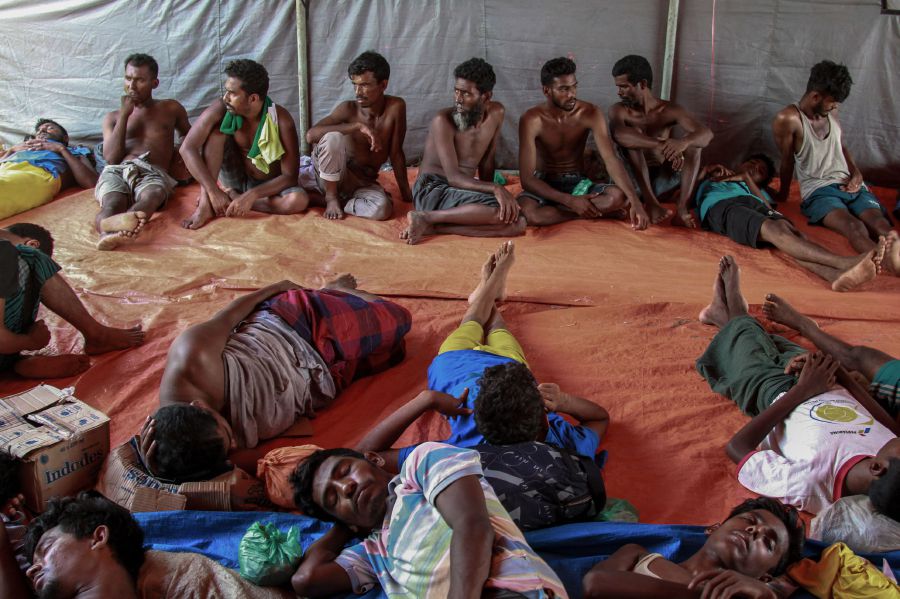 Rohingya refugees rest inside a tent in Kwala Langkat Village, in Langkat, North Sumatra, on May 23, 2024, a day after dozens of Rohingya refugee adults and children arrived by boat. - AFP pic