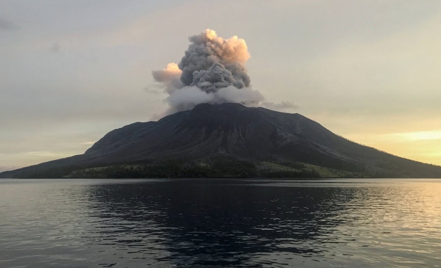Mount Ruang volcano spews volcanic ash as seen from Tagulandang in Sitaro Islands Regency, North Sulawesi province, Indonesia - REUTERS pic