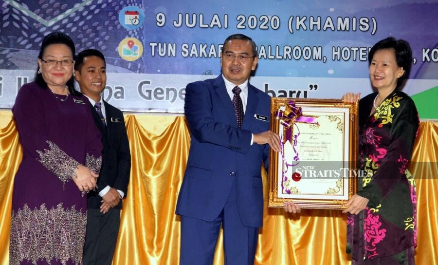 Sabah Education director Mistrine Radin (left) said it would be up to parents should they opt not to send their children back to school, especially if it was related to health issues. - NSTP/MALAI ROSMAH TUAH.