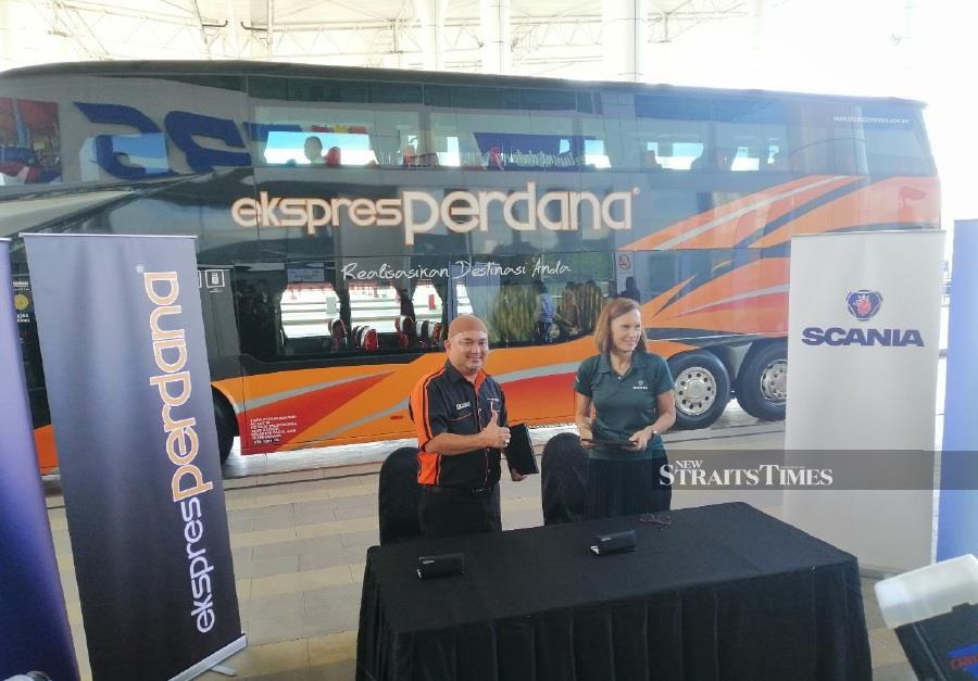 (From left) Perdana Express managing director Laili Ismail and Scania Southeast Asia Marie Sjodin Enstrom at the signing ceremony held at Terminal Bersepadu Selatan, Kuala Lumpur, Nov 27, 2019. Pic by Siti Syameen Md Khalili