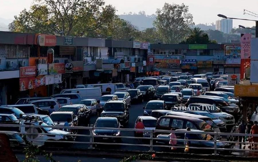 This file pic dated April 11, shows a busy street near the Foh Sang market in Kota Kinabalu. - Pic courtesy of NST reader.