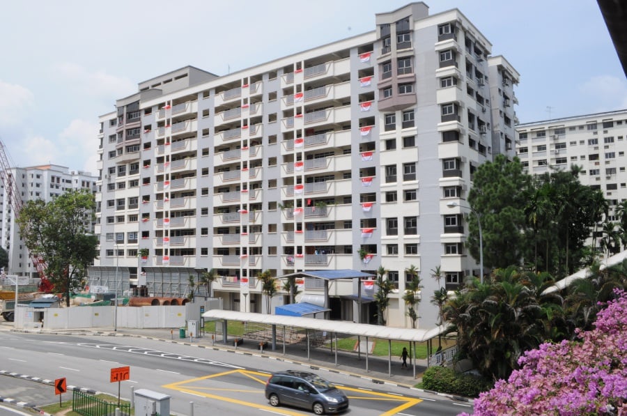 About 80 per cent of Singaporeans leave in HDB flats, which are leasehold properties and priced around SGD300,000 each. Datamine/Photo
